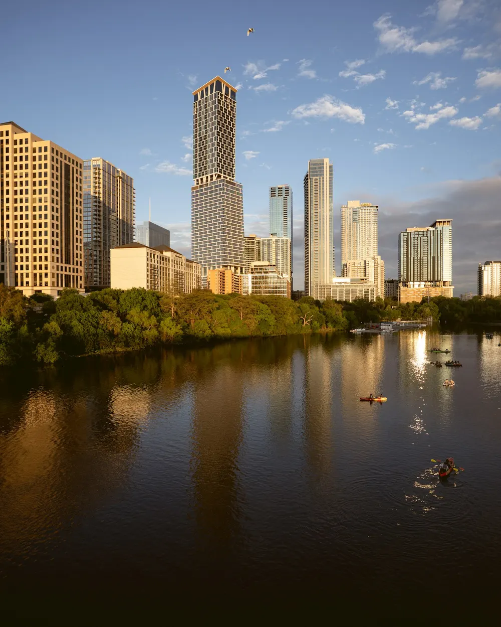 Austin’s skyline reflected in Lady Bird Lake at sunset